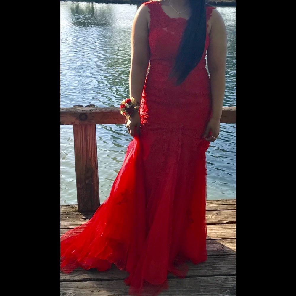 Red prom dress with a “flared/puffy” bottom